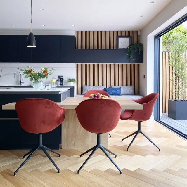 What a difference a year (and a half) makes 😂 Sometimes it seemed like this build would go on forever, but the memories on my phone just reminded me this time last year I was at @redbrick_mill with my client on a furniture sourcing trip. We found these amazing chairs at @boconcept_yorkshire and I just love the colour. So worth a trip if you’re shopping for home, especially since @mailboxlife in Birmingham has closed all its home stores 😩🤦‍♀️. We can’t do everything online, sometimes we actually want to look at stuff! I know it’s strange times and all that but I do worry for the survival of real shops outside of London, there’s nothing beats seeing and touching something in the flesh. I’m sure my assistant @mishmash_designs will testify to that with the amount of returns she has to process 😂. #luxurynewbuild #blackkitchen #wallpanelling #moderninteriordesign 
#dailyhomeshare
#designupnorth
#interiorboom
#spotlightonmyhome
#styleithappy
#myhometrend
#thiscreativehome
#myhomevibe
#ukicyou
#howwedwell
#apartmenttherapy
#designsponge
#walltowallstyle #swivelchair #velvetchair #herringbonefloor 
#mycreativeinterior
#interiorsthatcrush