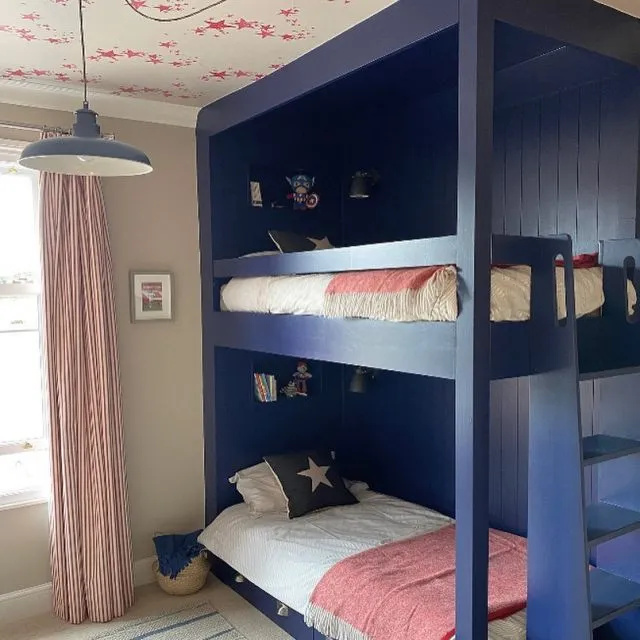 It’s been lovely working with @lauragrayinteriors and our gorgeous client to design and deliver this new bedroom for two lovely boys who tragically lost their Dad last year. The eldest hasn’t been able to sleep in his own bed since - until they arrived home from holiday to this brand new space. They thought all their Christmas’s had come at once 🥰  The request was for a nod to American/Hamptons style while in keeping with the classic interiors of the rest of the house. The family’s last holiday was a big America trip which they loved, so the client wanted to keep the connection through the design. These jobs are special because you’re making a tangible difference to someone’s life and bringing some much needed joy - never too young to appreciate good design 😉. #bunkbeds #bespokejoinery #kidsroomdecor #starsandstripes #interiordesignernottingham #wallpaperedceiling #roommakeover #beforeandafter #duluxwoodsmoke #duluxoxfordblue