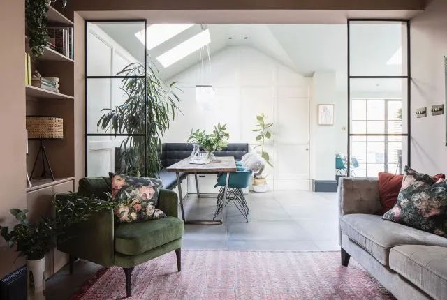 This room in the Epperstone project used to be more of a dining corridor from the hall to the kitchen round the corner (shown from the opposite side in the before pic) but we re-zoned the space and used these diy #crittal style dividers to create a snug. A simple trick but it’s made so much difference the the feel of it all 🙌 Colour Is Dead Salmon by @farrowandball . 📸 @jfrench_photo @mishytaylor_stylist #brokenplan #snug #wallpanelling #secretdoor #designupnorth #victorianhouse #crittaldoors #luxuryinteriorsonabudget #velvetsofa #hyggehome