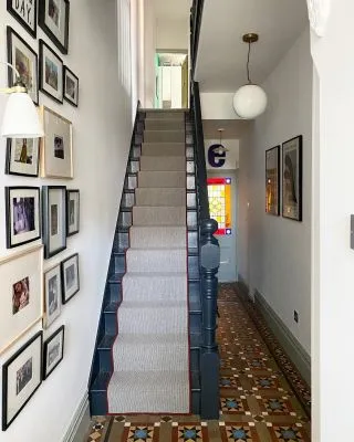Hallway makeover complete 🙌. So pleased we went for the rust edging on the stair runner, it really picks up on the tiles and stained glass. Might need to pop back and straighten that picture though 😬  Most ably assisted by @mishmash_designs 😘#myhousethismonth
#sassyhomestyle
#dailyhomeshare
#designupnorth
#luxuryinteriorsonabudget
#interiorboom
#mintontiles 
#spotlightonmyhome
#myfabhome
#styleithappy
#myhometrend
#gallerywall 
#thiscreativehome
#myhomevibe
#ukicyou
#myvintageabode
#howwedwell
#apartmenttherapy
#designsponge
#walltowallstyle
#myperiodhomestyle
#mycreativeinterior
#eclectichome
#victorianterrace
#victorianhallway
